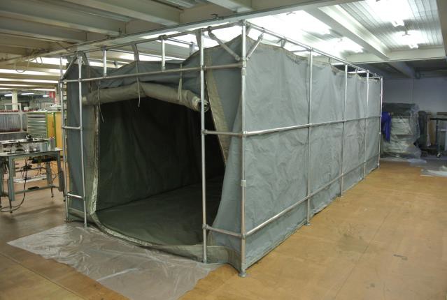 What is the principle of operation of EMC tents and fabrics?
